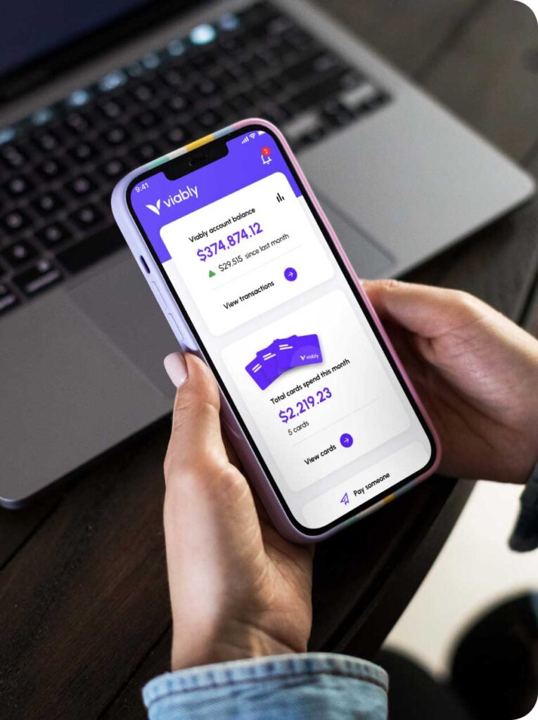 Viably app on iPhone screen showing account balance and banking